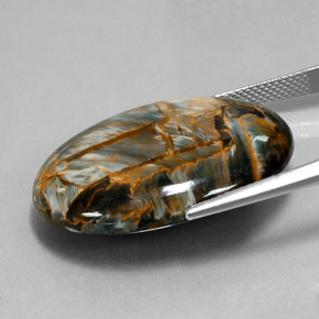 30.34캐럿 천연 회청색 피터사이트, 타원형 컷, 30.1×22.1 mm, 불투명체