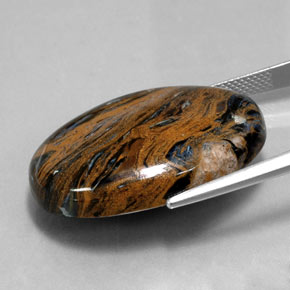 36.42캐럿 천연 멀티컬러 피터사이트, 타원형 컷, 29.9×22.1 mm, 불투명체