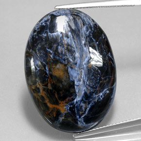 27.74캐럿 천연 멀티컬러 피터사이트, 타원형 컷, 30.1×22.1 mm, 불투명체