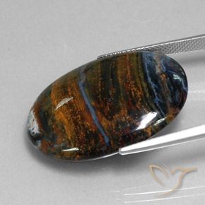 24.09캐럿 천연 멀티컬러 피터사이트, 타원형 컷, 28.8×21.8 mm, 불투명체