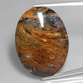 25.47캐럿 천연 멀티컬러 피터사이트, 타원형 컷, 30.2×22.4 mm, 불투명체