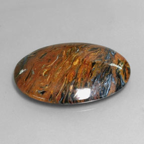 25.47캐럿 천연 멀티컬러 피터사이트, 타원형 컷, 30.2×22.4 mm, 불투명체