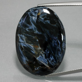 26.70캐럿 천연 멀티컬러 피터사이트, 타원형 컷, 29.2×21.6 mm, 불투명체