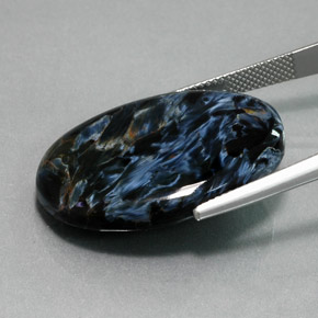26.70캐럿 천연 멀티컬러 피터사이트, 타원형 컷, 29.2×21.6 mm, 불투명체
