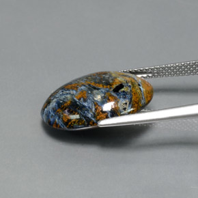 7.33캐럿 천연 멀티컬러 피터사이트, 타원형 컷, 17.6×13.1 mm, 불투명체