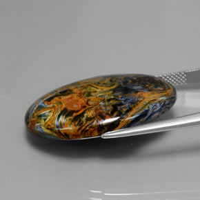 24.42캐럿 천연 멀티컬러 피터사이트, 타원형 컷, 28.8×21.4 mm, 불투명체