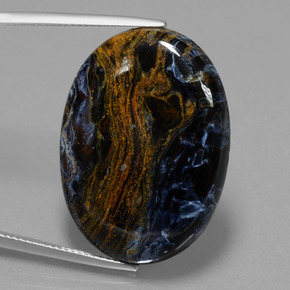 28.85캐럿 천연 멀티컬러 피터사이트, 타원형 컷, 30.2×22.1 mm, 불투명체