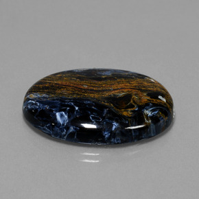 28.85캐럿 천연 멀티컬러 피터사이트, 타원형 컷, 30.2×22.1 mm, 불투명체