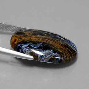 28.85캐럿 천연 멀티컬러 피터사이트, 타원형 컷, 30.2×22.1 mm, 불투명체