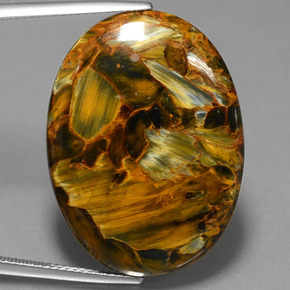 25.72캐럿 천연 멀티컬러 피터사이트, 타원형 컷, 29.9×22.2 mm, 불투명체