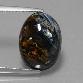 6.33캐럿 천연 멀티컬러 피터사이트, 타원형 컷, 14.2×10.4 mm, 불투명체