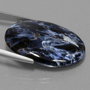 27.49캐럿 천연 멀티컬러 피터사이트, 타원형 컷, 30×21.6 mm, 불투명체