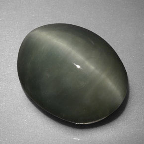 6.16캐럿 천연 그린 Quartz Cat's Eye, 타원형 컷, 12.9×10.1 mm, 불투명체