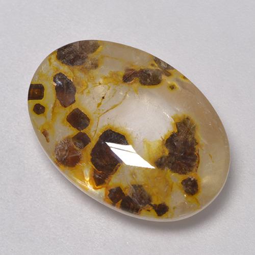 11.35캐럿 천연 멀티컬러 마카사이트 포함 쿼츠, 타원형 컷, 18.8×13.1 mm, 투명한