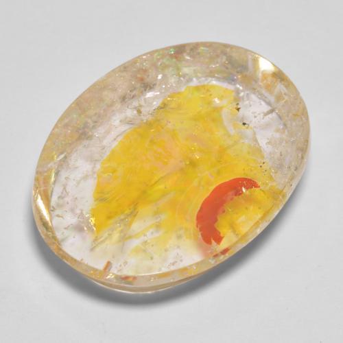 22.71캐럿 천연 골든 옐로우 마카사이트 포함 쿼츠, 타원형 컷, 22.5×17.3 mm, 투명한
