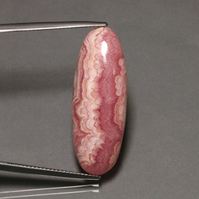 19.58캐럿 천연 멀티컬러 로도크로사이트, 타원형 컷, 31.7×11.7 mm, 불투명체