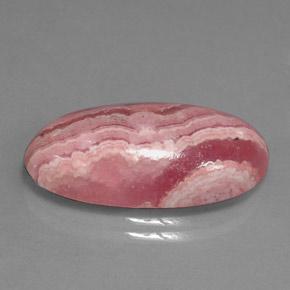 15.90캐럿 천연 멀티컬러 로도크로사이트, 타원형 컷, 23.2×11.8 mm, 불투명체