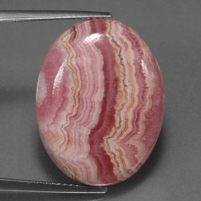 24.57캐럿 천연 멀티컬러 로도크로사이트, 타원형 컷, 23.2×18.1 mm, 불투명체