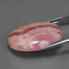 24.57캐럿 천연 멀티컬러 로도크로사이트, 타원형 컷, 23.2×18.1 mm, 불투명체