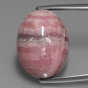 25.74캐럿 천연 멀티컬러 로도크로사이트, 타원형 컷, 20.2×15.2 mm, 불투명체