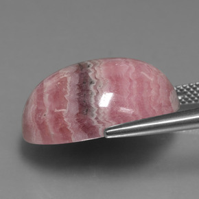 25.74캐럿 천연 멀티컬러 로도크로사이트, 타원형 컷, 20.2×15.2 mm, 불투명체