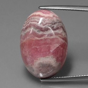 26.95캐럿 천연 멀티컬러 로도크로사이트, 타원형 컷, 21.4×15.4 mm, 불투명체