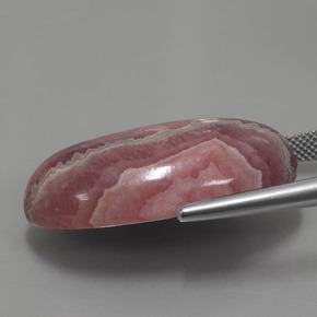 56.15캐럿 천연 멀티컬러 로도크로사이트, 타원형 컷, 31.7×19.9 mm, 불투명체