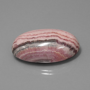 62.39캐럿 천연 멀티컬러 로도크로사이트, 타원형 컷, 31.6×20.1 mm, 불투명체