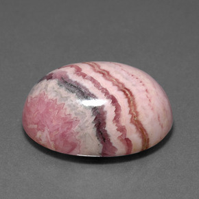 23.72캐럿 천연 멀티컬러 로도크로사이트, 타원형 컷, 20.2×15.3 mm, 불투명체