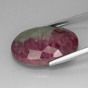 31.96캐럿 천연 멀티컬러 루비 조이사이트, 타원형 컷, 25.1×17.9 mm, 불투명체