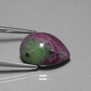 25.42캐럿 천연 멀티컬러 루비 조이사이트, 배 모양, 19.7×14.4 mm, 불투명체