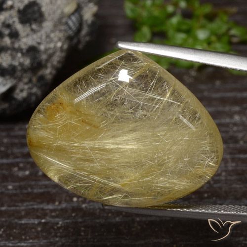 32.98ct 자연스러운 미디엄 옐로우 루틸 쿼츠, 배 모양, 투명한