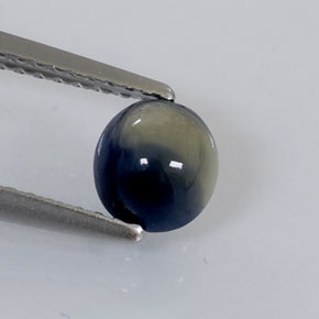 1.05캐럿 천연 바이컬러 사파이어, 타원형 컷, 5.9×5.4 mm, 불투명체