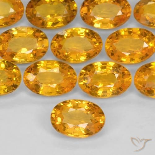 0.60ct 자연스러운 오렌지-골드 사파이어, 타원형, VS