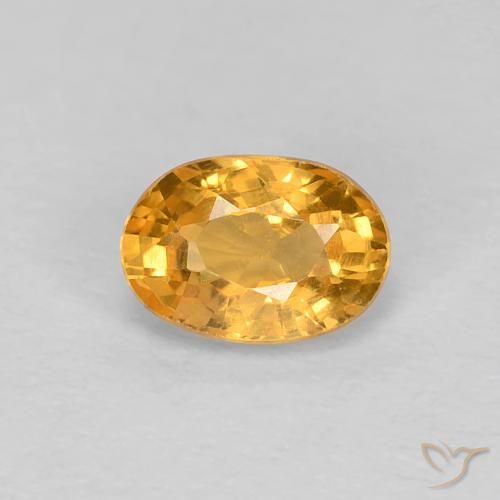 0.65ct 자연스러운 오렌지-골드 사파이어, 타원형, VS