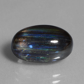 6.73캐럿 천연 레인보우 컬러 스카폴라이트, 타원형 컷, 13.6×9.2 mm, 투명한