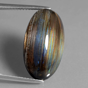 13.48캐럿 천연 레인보우 컬러 스카폴라이트, 타원형 컷, 21.3×11.3 mm, 투명한