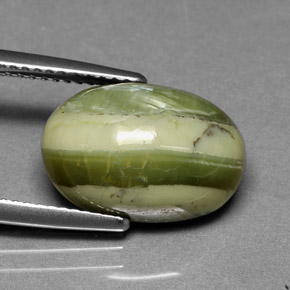 5.70캐럿 천연 노란빛 그린 서펜틴, 타원형 컷, 14.7×10 mm, 불투명체