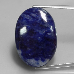 31.17캐럿 천연 바이올렛 블루 소달라이트, 타원형 컷, 29.7×20.9 mm, 불투명체