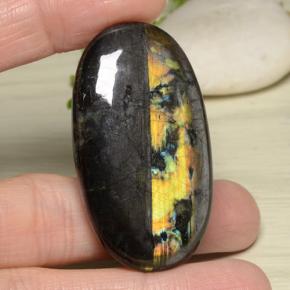 61.44캐럿 천연 멀티컬러 스펙트롤라이트, 타원형 컷, 45.3×25.4 mm, 불투명체