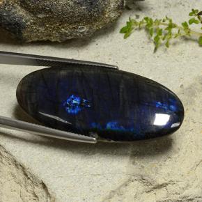 27.66캐럿 천연 멀티컬러 스펙트롤라이트, 타원형 컷, 40.6×18.1 mm, 불투명체