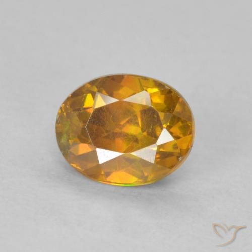 0.70ct 자연스러운 미디엄 오렌지 섬아연석, 타원형, SI-I1