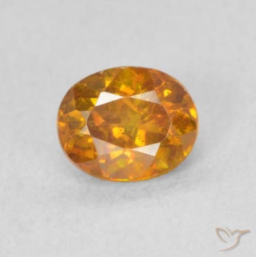 0.59ct 자연스러운 미디엄 오렌지 섬아연석, 타원형, SI