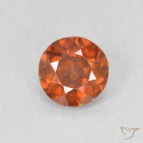 0.68ct 자연스러운 붉은 오렌지 섬아연석, 둥근, VS-SI