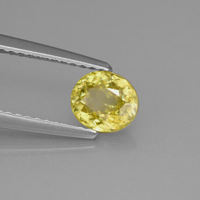 0.75캐럿 천연 골든 옐로우 스펜(티타나이트), 타원형 컷, 6.1×5.4 mm, VS