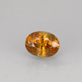 0.99캐럿 천연 골든 오렌지 스펜(티타나이트), 타원형 컷, 6.6×4.9 mm, VS