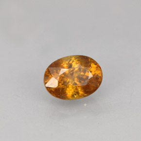 0.99캐럿 천연 골든 오렌지 스펜(티타나이트), 타원형 컷, 6.6×4.9 mm, VS