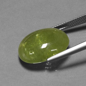 21.01캐럿 천연 노란빛 그린 스펜(티타나이트), 타원형 컷, 18.9×15.1 mm, 투명한