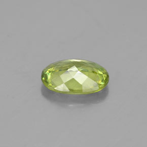 0.84캐럿 천연 골든 그린 스펜(티타나이트), 타원형 컷, 7.1×5.2 mm, VVS-VS