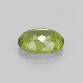 0.96캐럿 천연 골든 그린 스펜(티타나이트), 타원형 컷, 7.1×5.1 mm, VS
